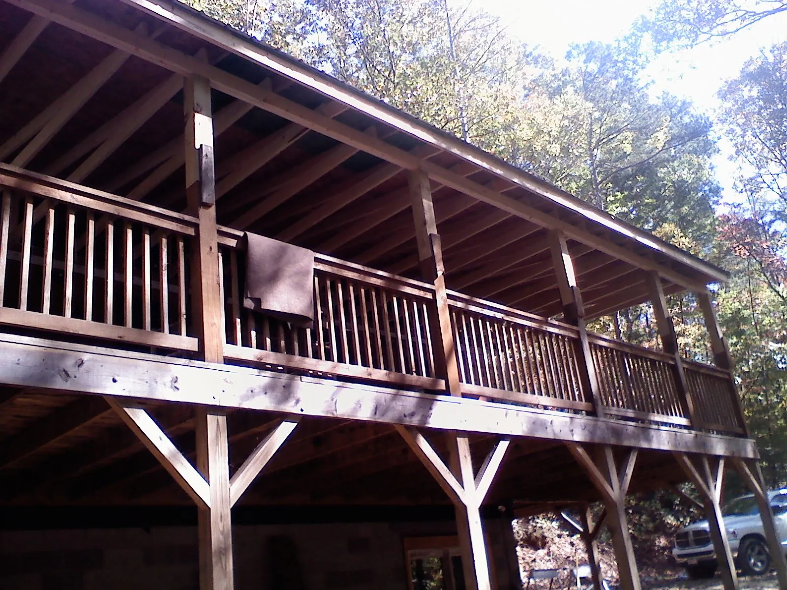 Timber framing under a new elevated porch and deck — Roof Leak Repair in Mckinney by Roofing Brothers